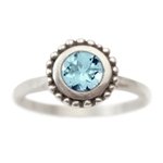 Cosmos Engagement ring with Blue Topaz