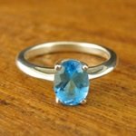 Oval Blue Topaz Ring in White Gold